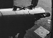 SUU-11/A pod in the cargo door of an AC-47