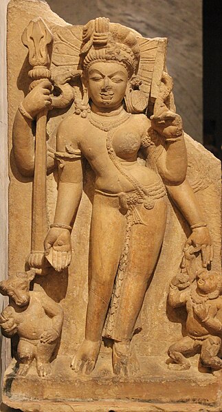 Ardhanarishvara, the composite deity of Shiva and his consort Parvati. As in other images of this form, the tribhanga is accentuated by the gender dif