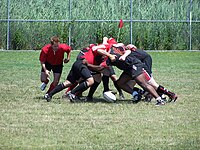 A scrum in rugby sevens Sevens scrum.jpg