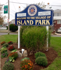 A welcome sign to Island Park.