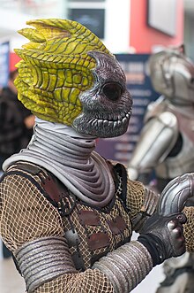 Silurians, with their masks on, on display at an exhibition Silurian (11030208396).jpg