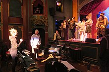 Director talking to the cast during a dress rehearsal of Snow White Snow White - Dress Rehearsal.jpg