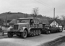 A Sd. Kfz. 7 of the Royal Hungarian Army towing road trailer, Hungary 1944 Sonderkraftfahrzeug 7, 1944-ben a 3-as uton. Fortepan 72709 crop.jpg