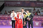 Deutsch: Tischtennis bei den Olympischen Jugendspielen 2018; Tag 9, 15. Oktober 2018; Mixed Medaillenzeremonie - Gold: Yingsha Sun & Wang Chuqin (CHN), Silber: Miu Hirano & Tomokazu Harimoto (JPN), Bronze: Su Pei-ling & Lin Yun-ju (TPE)); Medaillen-Verleiher: IOC member Ryu Seung-minu (KOR), Maskottchen-Verleiher: ITTF Vice-Presiden Nestor Tenca (ARG) English: Table tennis at the 2018 Summer Youth Olympics at 15 October 2018 – Mixed Medal Ceremony - Gold: Yingsha Sun & Wang Chuqin (CHN), Silver: Miu Hirano & Tomokazu Harimoto (JPN), Bronze: Su Pei-ling & Lin Yun-ju (TPE)); Medal presenter: IOC member Ryu Seung-minu (KOR), Mascot presenter: ITTF Vice-Presiden Nestor Tenca (ARG)