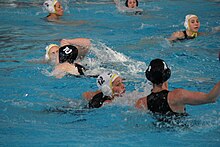 Arancini (top right in white cap) in the third of a five-game test series against the Great Britain women's national water polo team on 25 February 2012. Australia won 15-6 Test 3 Aus v GB at AIS 0050.JPG