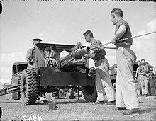 Gunners sponging out an 18/25-pounder Mk V P during exercises in the UK, 1939. The British Army in the United Kingdom 1939-45 H547.jpg