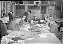 Sub-editor's room at the offices of the Daily Mail newspaper in 1944 The Makings of a Modern Newspaper- the Production of 'The Daily Mail' in Wartime, London, UK, 1944 D20471.jpg