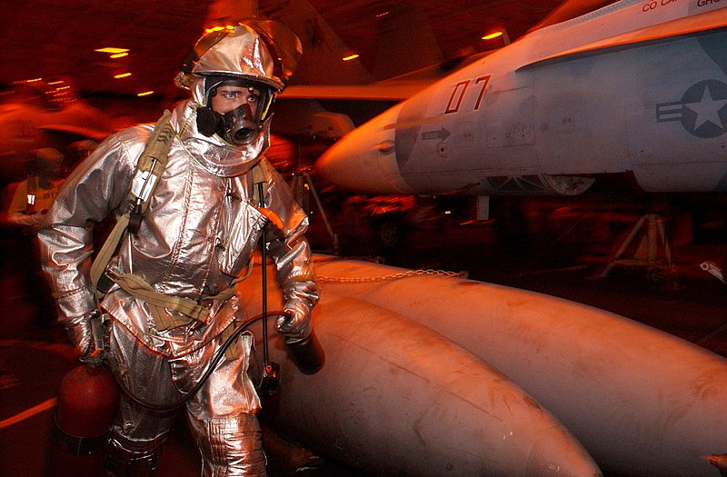 File:US Navy 040417-N-9851B-002 Aviation Boatswain's Mate Airman Orin Smith grabs a CO2 fire extinguisher as he rushes to a simulated aircraft fire.jpg