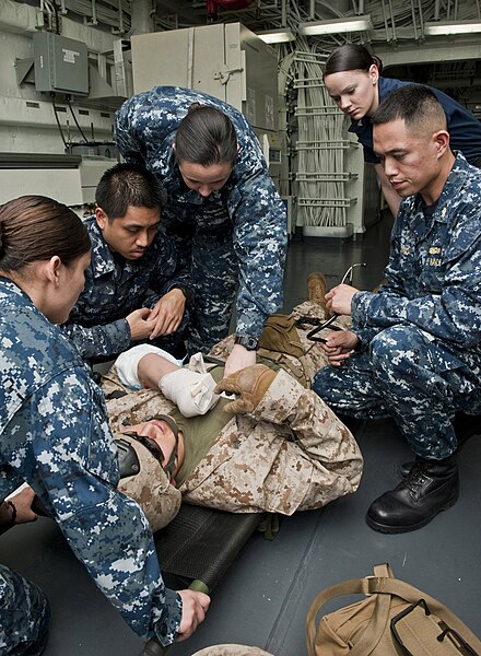 File:US Navy 120105-N-DX615-016 Medical personnel evaluate a simulated patient during a medical evacuation drill aboard the amphibious assault ship USS.jpg