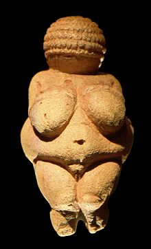 Venus of Willendorf; c. 26,000 BC (the Gravettian period); limestone with ocre coloring; Naturhistorisches Museum (Vienna, Austria) Venus of Willendorf frontview retouched 2.jpg
