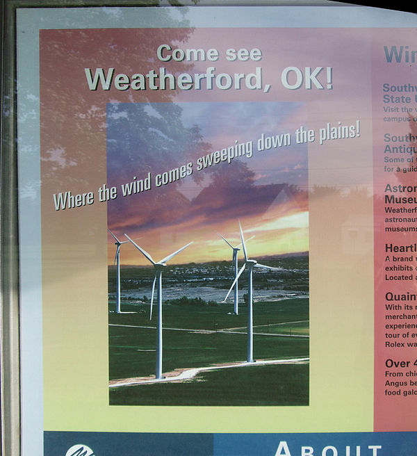 Wind power promotional poster near the blade display