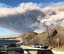 The smoke plume from the Woolsey Fire, seen from the Pacific Coast Highway Woolsey Fire evacuation from Malibu on November 9, 2018.jpg