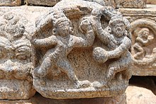 Chola Soldiers in battle at Airavatesvara Temple "Airavatesvara Temple wall details".JPG