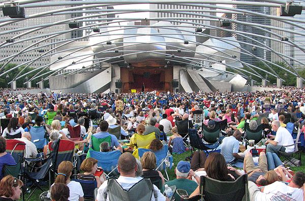 Concertgoers listen to Beethoven's Ninth Symphony at the Jay Pritzker Pavilion, the centerpiece of Millennium Park.