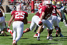 Gaffney receiving a handoff from Kevin Hogan in 2013. 2013.10.19 UCLA at Stanford.jpg