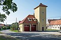 * Nomination Fire station in Grodziszcze --Jacek Halicki 07:33, 28 September 2020 (UTC) * Promotion  Support Good quality (maybe a small right crop to avoid the car?) --ArildV 07:37, 28 September 2020 (UTC)