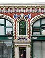 The building's facade featuring the replicas of della Robbia's Tondi