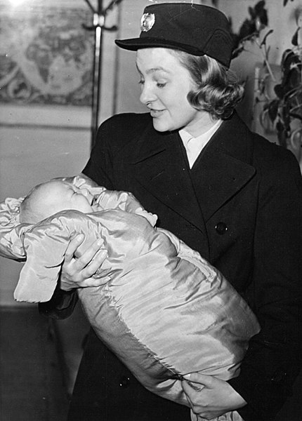 File:Baby-with-flight-attendant-391764680257.jpg