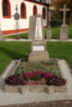 English: Graveyard next to catholic church in Bad Salzschlirf, Hesse, Germany