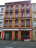 Tenement house with a shop area, in a closed area