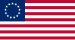 La première version du drapeau des États-Unis, sur laquelle ne figuraient que treize étoiles. C'est la seule où les étoiles forment un cercle.