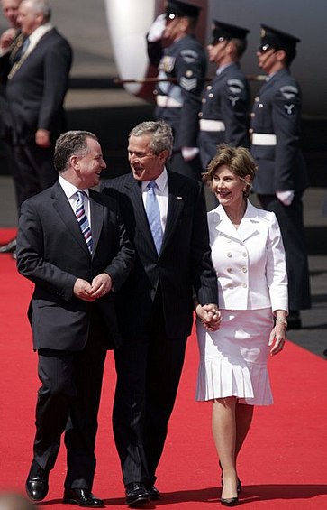 McConnell greets the US President, George W. Bush, and the first lady, Laura Bush, at Prestwick Airport, 2005