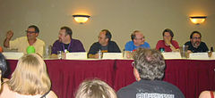 A panel of experts (including cartoonist John Kovalic, far left, and author Brian Keene, far right), debate who would win in a fight: Frankenstein's Monster or Cookie Monster. CONvergence Panel.jpg