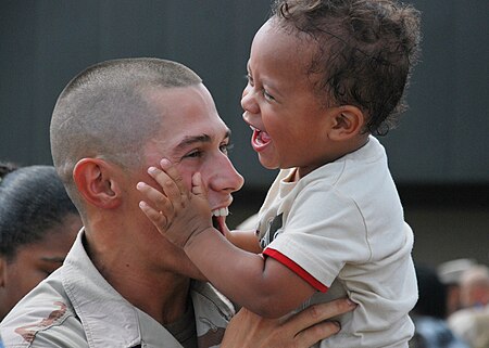 Fail:Defense.gov News Photo 100721-N-7084M-871 - A U.S. Navy sailor assigned to Naval Mobile Construction Battalion 133 greets his son during a homecoming ceremony for the unit in Gulfport Miss..jpg