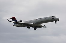 A Delta Connection Bombardier CRJ700, operated by SkyWest, landing at Vancouver in 2008