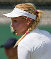 Donna Vekić competing in the first round of the 2015 Wimbledon Qualifying Tournament at the Bank of England Sports Grounds in Roehampton, England. The winners of three rounds of competition qualify for the main draw of Wimbledon the following week.