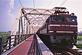 An EF81 locomotive on the Akagawa Bridge in August 2013