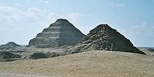 View of Saqqara necropolis, including Djoser's step pyramid (centre), the Pyramid of Unas (left) and the Pyramid of Userkaf (right) Egypt.Saqqara.Panorama.01.jpg