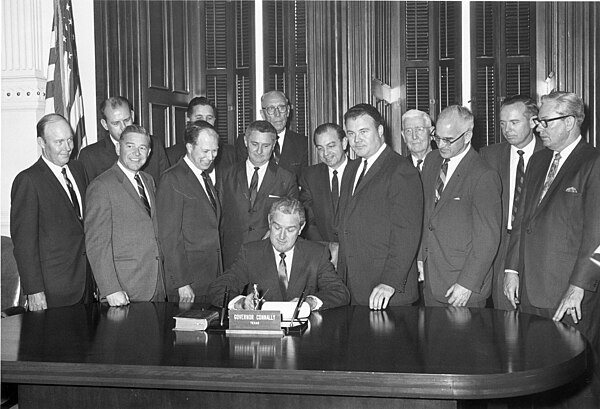 Gov. John Connally signing the bill that separated Arlington State College from the Texas A&M University System in 1965