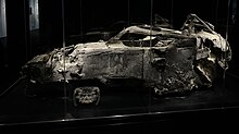 The front half of the wreckage of Grosjean's car, on display in 2023. Grosjean's crash wreckage.jpg
