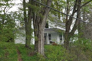 The Raubold House is a historic house on Chesham Road in Harrisville, New Hampshire. Completed in 1901, it is a good example of a vernacular house built for immigrant mill workers. The house was listed on the National Register of Historic Places in 1988.