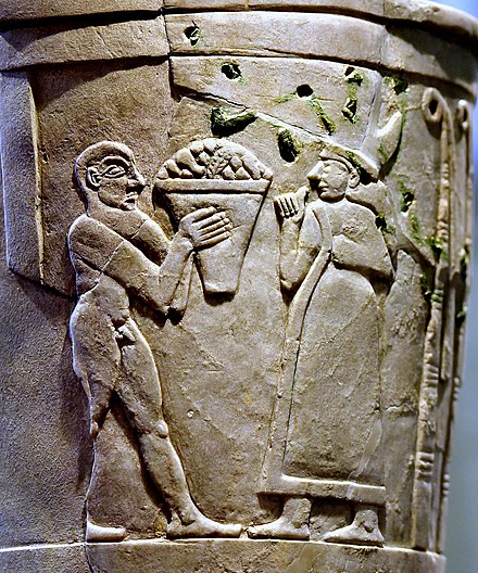 Inanna receiving offerings on the Uruk Vase, circa 3200–3000 BCE