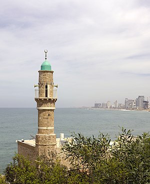 Al-Bahr minaret and Tel Aviv skyline.