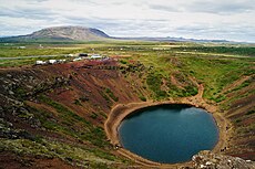 Kerið crater lake view from crater rim towards parking lot.jpg