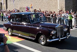 King Charles III being driven through Cardiff in a 1978 Rolls-Royce Phantom VI State limousine. King Charles III in Cardiff (geograph 7290021)crop.jpg