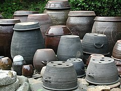 Onggi, usually kimchi, sauces or soybean paste are stored