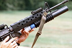 Loading M203 40 mm grenade launcher attached to an M16 rifle.jpg