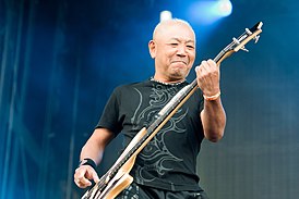 Масаёси Ямасита в 2010 году на концерте в Гамбурге, Германия.