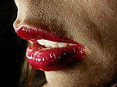 Lips of a young woman wearing red lipstick Lujuria Lust Tentacion (3973672868).jpg