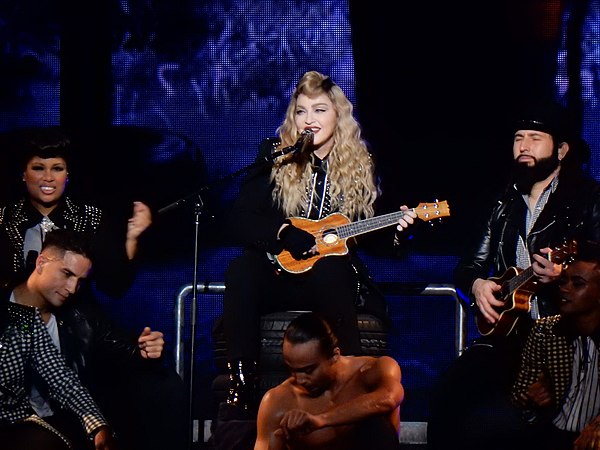 Madonna performing an acoustic version of "True Blue" on the Rebel Heart Tour (2015–2016)