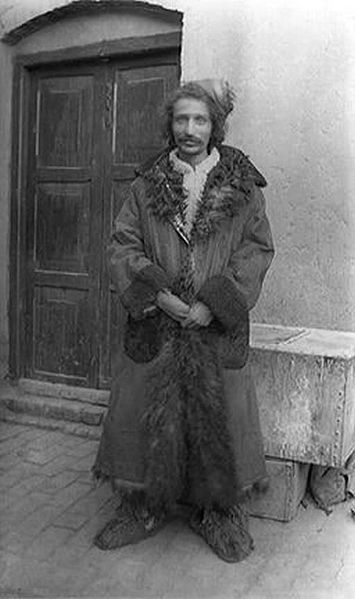 File:Meher Baba in long coat.jpg