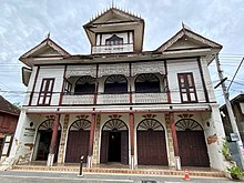 Moung Ngwe Zin, an example of gingerbread commercial buildings in Lampang Moung Ngwe Zin - front.jpg