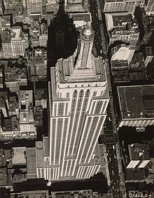 The Empire State Building in 1932. The building's antenna was installed 21 years later, in 1953. NARA Empire State Building.jpg