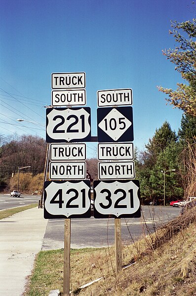 File:NC 105 with Truck Signs.jpg