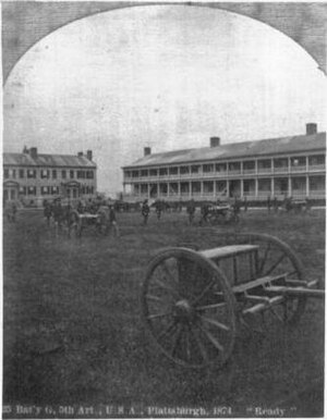 An 1874 stereoview photo card depicting Battery G of the 5th U.S. Artillery drilling on the parade ground at Plattsburgh Barracks. Note the adjacent officer's quarters to the left which was demolished in 1964. OldStoneBarracks1874.jpg