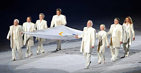 Murray (third from left) was one of 8 notable Canadians to carry the Olympic Flag at the 2010 Olympic Opening Ceremony